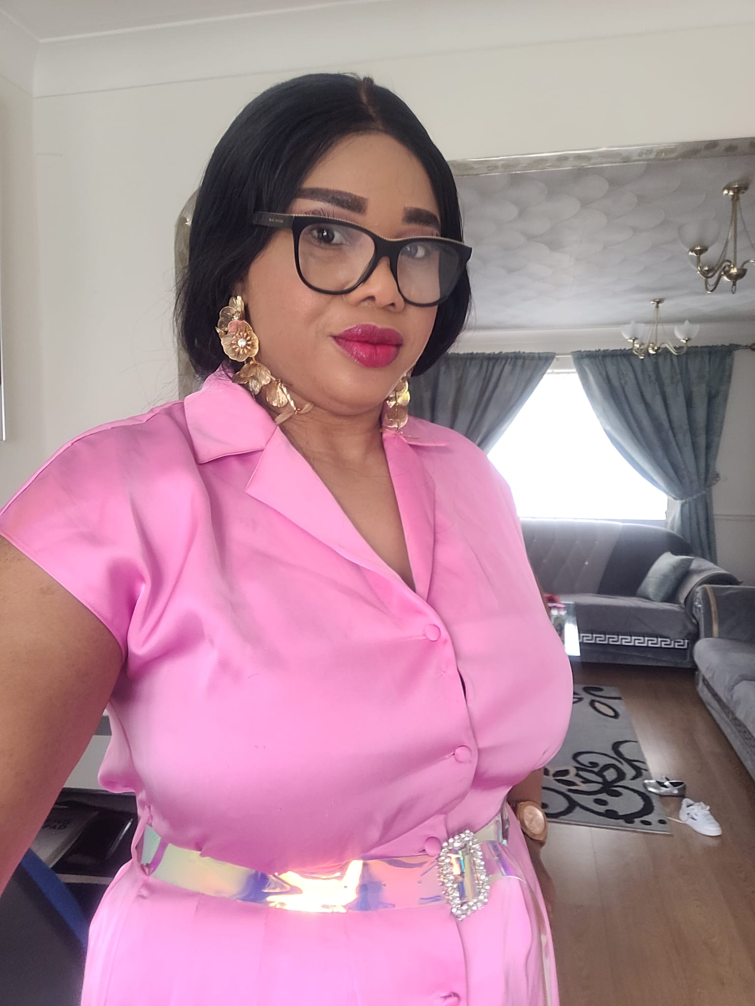 Owner of Joyous Events wearing a pink outfit